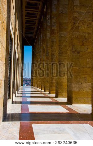 The Narrow Passage With The Pattern Columns Making Shadows Aroun