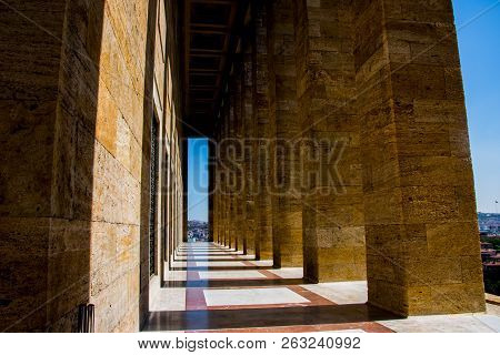 The Narrow Passage With The Pattern Columns Making Shadows Aroun