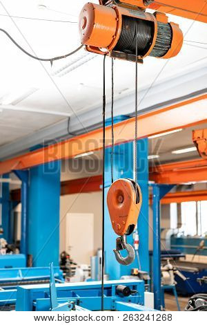 Crane Hook. The System Of Pulleys And Ropes, A Hanging Mechanism In The Production Area. Movement Re