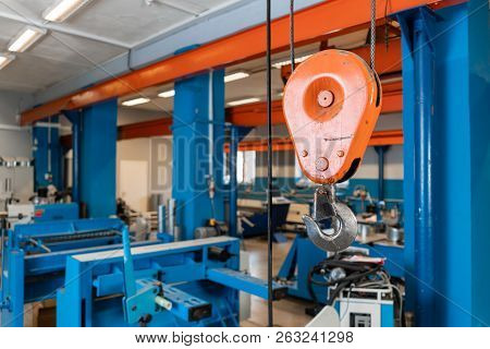 Crane Hook. The System Of Pulleys And Ropes, A Hanging Mechanism In The Production Area. Movement Re