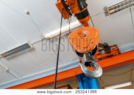 Crane Hook. The System Of Pulleys And Ropes, A Hanging Mechanism In The Production Area. Movement Re