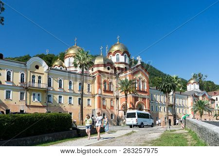 New Athos, Abkhazia-july 29, 2014: The Architecture Of The Ancient Monastery Against The Blue Sky.