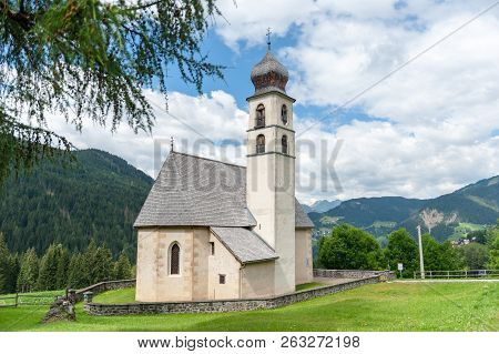 The Church Of The Village Of Santa Fosca In The Italian Dolomites