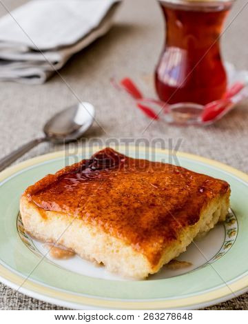 Balkan Dessert Cake Trilece With Caramel Sauce And Tea.
