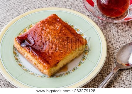 Balkan Dessert Cake Trilece With Caramel Sauce And Tea.