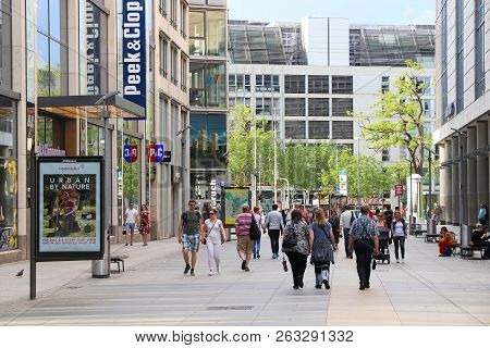 Dresden, Germany - May 10, 2018: People Visit Modern Shopping Street In Dresden, Germany. Dresden Is