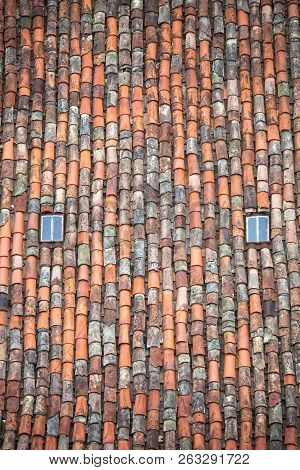 Roof Made Of Clay Tiles With Two Windows