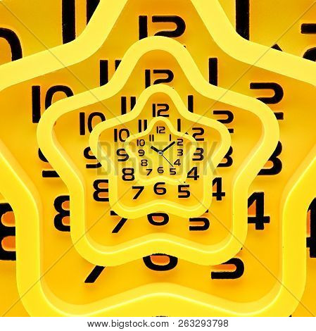 Yellow Watch With Five Petals. Alarm Clock On A White Background.drost Effect.