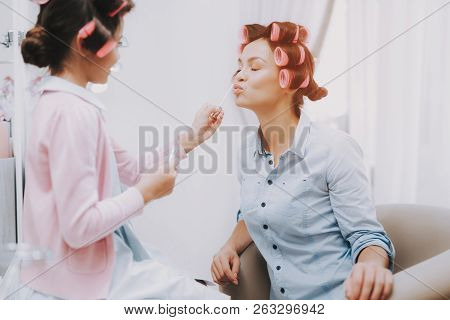 Little Lady With Curlers. Girl With Lipstick. Girl In Beauty Salon. Lipstick In Hands. Consept Beaut