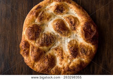 Turkish Ramadan Bread - Ramazan Pidesi On Wooden Surface / Pide