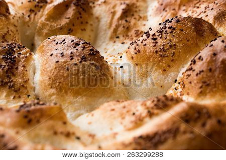 Turkish Ramadan Bread - Ramazan Pidesi On Wooden Surface / Pide