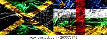 Jamaica Vs Central African Republic Smoke Flags Placed Side By Side. Thick Colored Silky Smoke Flags