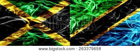 Jamaica Vs Tanzania, Tanzanian Smoke Flags Placed Side By Side. Thick Colored Silky Smoke Flags Of J