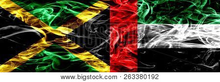 Jamaica Vs United Arab Emirates, Emirati Smoke Flags Placed Side By Side. Thick Colored Silky Smoke 
