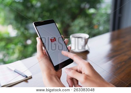 Chiang Mai, Thailand - August 18,2018: Woman  Holding Huawei With Tmall Apps On The Screen.tmall.com