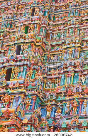 Sculptures on Hindu temple gopura (tower). Menakshi Temple, Madurai, Tamil Nadu, India