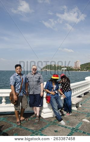 Thai People And Foreigner Travelers Visit Travel And Posing For Take Photo At Laem Thaen Cape In Cho