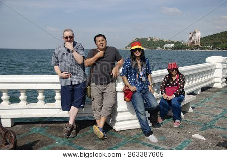 Thai People And Foreigner Travelers Visit Travel And Posing For Take Photo At Laem Thaen Cape In Cho