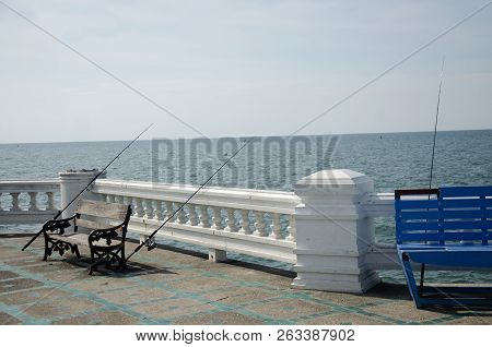 Thai Angler Or Fisherman Use Fishing-rod Fishing Fish In The Sea At Coast Of Laem Thaen Cape And Sce