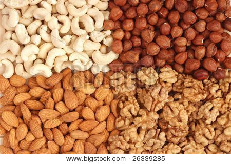 Lähikuva erilaisia pähkinöitä (almons, cashew, saksanpähkinää ja filbers)