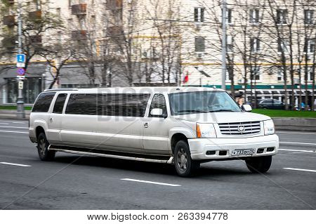 Moscow, Russia - May 2, 2018: White Limousine Cadillac Escalade In The City Street.