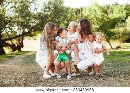 A Large Family With Homosexual Parents. Two Mothers.