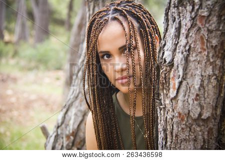 Young And Beautiful Girl With Braided Hair