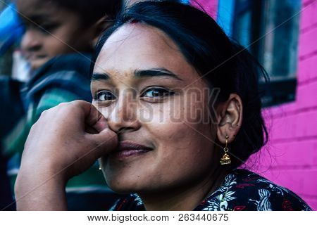 Bandipur Nepal October  15, 2018 Closeup Of Young Woman Seating Front Her House In A Side Street Of 