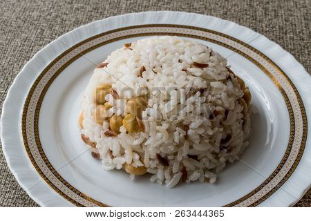 Turkish Rice With Chickpea Served With Salt And Pepper / Nohut Pilav.
