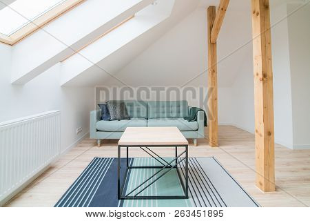 Slanted Ceiling Living Room. Modern Bright Flat Apartment In The Attic