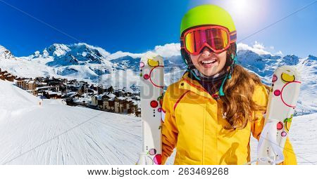 Ski teenager sport having fun on winter vacation on the slope, Val Thorens, 3 Valleys, France.