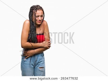 Young braided hair african american with pigmentation blemish birth mark over isolated background with hand on stomach because nausea, painful disease feeling unwell. Ache concept.