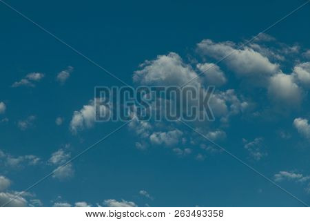 The Background Is Natural. Blue Sky And Clouds. Cropped Shot, Isolated, Close-up, Blurred