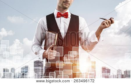 Double Exposure Of Confident And Young Businessman In Smart-casual Wear Smoking Pipe And Modern City