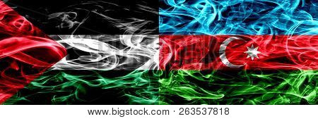 Palestine Vs Azerbaijan, Azerbaijani Smoke Flags Placed Side By Side. Thick Colored Silky Smoke Flag