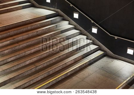 Stone staircase and wall lamps