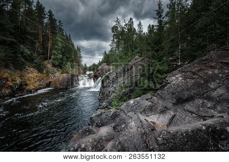 Kivach Waterfall On The River Suna In The Republic Of Karelia. Cold Summer In The Northern Forests.