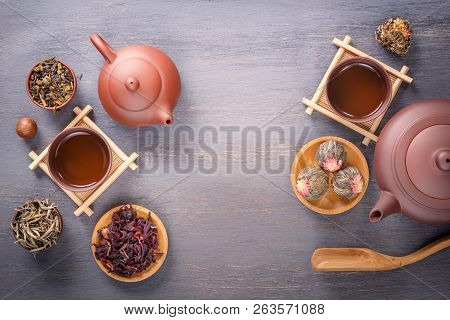 Several Types Of Green Tea, Black Tea, Hibiscus Tea And Tea Ceremony Attributes - A Ceramic Teapot, 