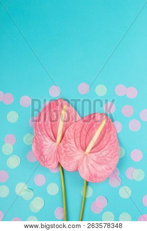 Two Laceleafs On Blue Background. Decorated With Multicolor Confetti. Flat-lay, Top View. Copy Space
