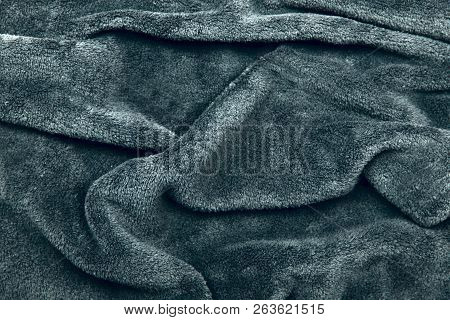 Background And Texture. The Blurred Image Of The Texture Of The Fabric For Clothing. Gray Fur. Cropp