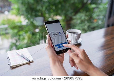 Chiang Mai, Thailand - August 18,2018: Woman Holding Huawei Mobile Phone With Linkedin Application O