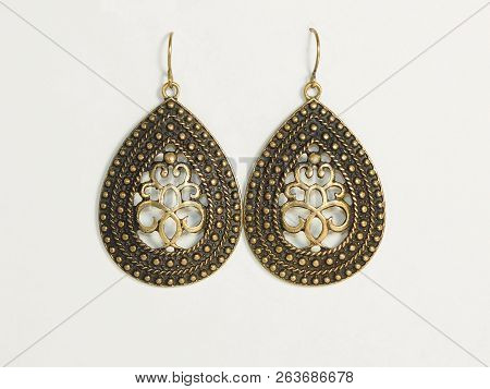 Vintage Earrings Isolated On White Background. Jewelry Piece.