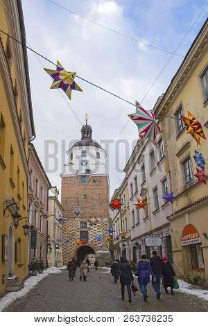Lublin, Poland - January 17, 2018: Bramowa Street With Christmas Decorations And Brama Krakowska (kr