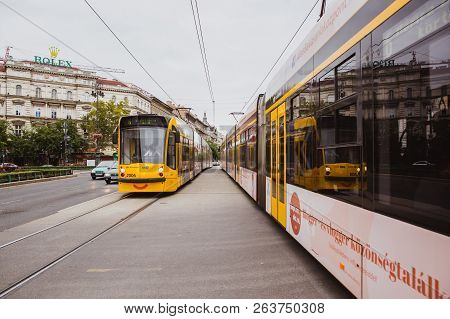Budapest, Hungary - September 29, 2018: Yellow Trams With A Smile On Andrassy Street In The Central 