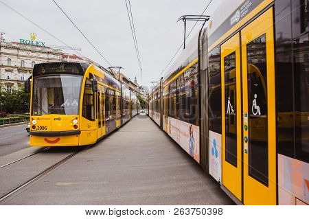 Budapest, Hungary - September 29, 2018: Yellow Trams With A Smile On Andrassy Street In The Central 