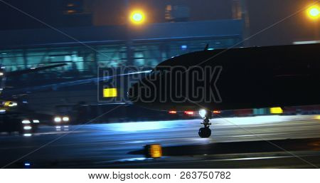 Airport with modern airplane on airstrip preparing for takeoff.