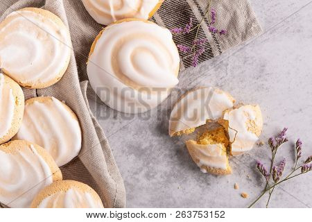 Cookies With Egg White Cover. Portuguese Sweets Known As Cavacas On Napkin In A Table.