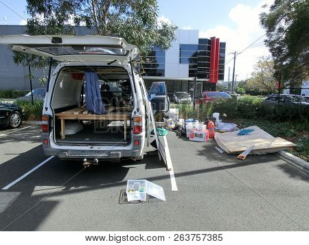 An Empty Campervan On A Public Carpark
