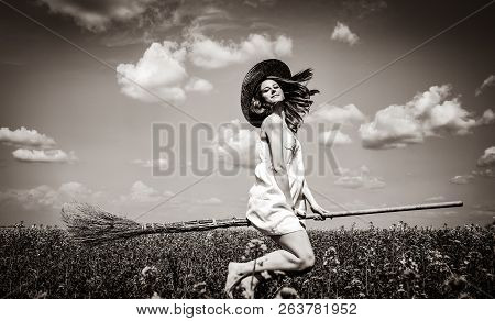 Enchantress Fly Over Spring Rapeseed Field At Broom. Image In Black And White Style