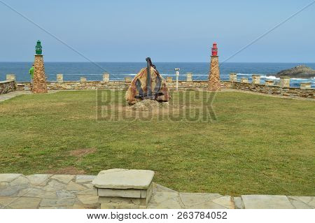 Monument With An Anchor And Two Lanterns In Tapia De Casariego. Nature, Travel, Recreation. August 2